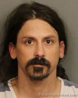 Mugshot of DUSTIN CORY CASMUS