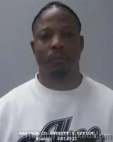 Booking photo from Madison County, Alabama