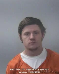 Booking photo from Madison County, Alabama