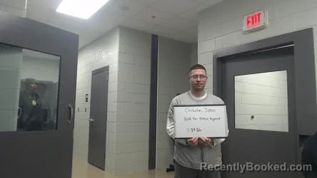 Mugshot of JOHN CHISOLM