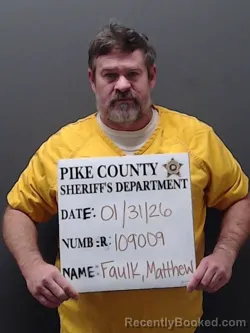 Mugshot of MATTHEW FAULK