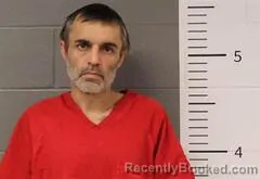 Booking photo from St Clair County, Alabama