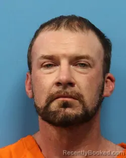 Mugshot of MATTHEW NELSON BURNETT