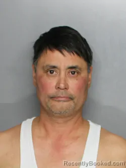 Mugshot of SHAN JASON SWELLAND