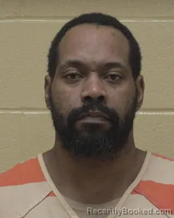 Mugshot of DEMARIO THEUS