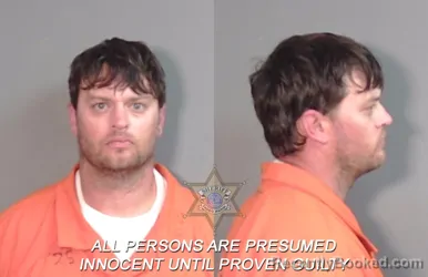 Mugshot of Thomas Kyle Plunkett