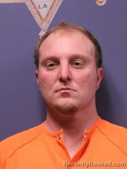 Mugshot of JOHN LANDON MIRANDA