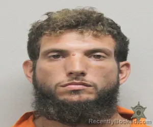 Mugshot of CODY JAMES REVETT