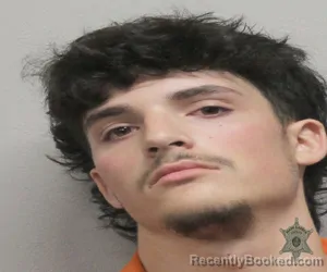 Mugshot of AUSTIN CARMOUCHE