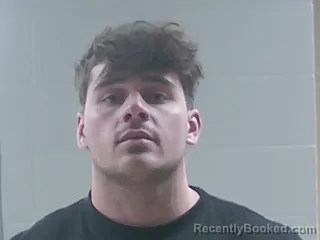 Mugshot of HOLDEN NICHOLAS COURVILLE