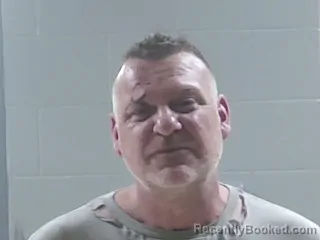 Mugshot of TRAVIS CHARLES RICHERT