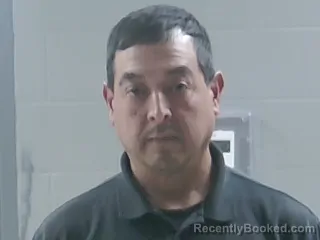 Mugshot of JOHN MICHAEL FLORES