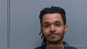 Mugshot of JUSTIN SHAKUR DOUGLAS