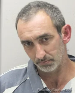 Mugshot of TOMMY JAMES MENARD