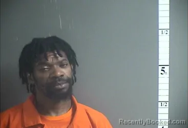 Mugshot of RAHEEN J FLOYD