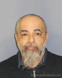 Mugshot of MURAT A GENC