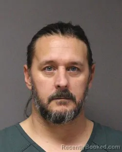 Mugshot of JOHN DANIEL MELIA