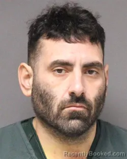 Mugshot of MICHAEL SANTINO SHECTON