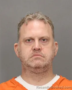 Mugshot of JOHN M SZYMANSKI