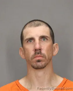 Mugshot of JOHN R WAUGH