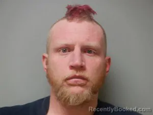 Mugshot of John Emory Bragg