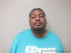 Mugshot of Thomas Kadell Hughes