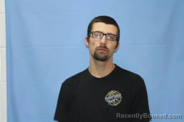 Mugshot of DUSTIN WAYNE MOORE