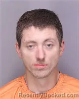 Mugshot of TRAVIS DYLAN COOPER