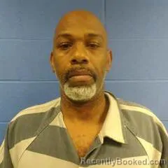 Mugshot of BASILLIO NESBY