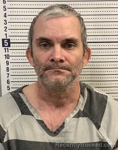 Mugshot of DEREK HENN