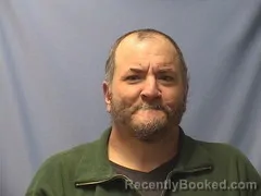 Mugshot of JASON GREBE
