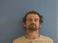 Mugshot of JUSTIN ALLEN HOLLAND