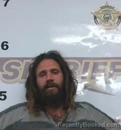 Mugshot of JAMES HUETT