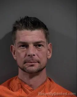 Mugshot of ZACHARY THOMAS KARKUTT