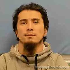 Mugshot of TOLEGENOV ZHASSULAN