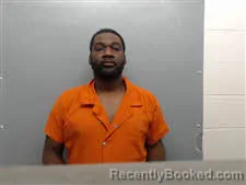 Mugshot of JOHNNY A COOPER