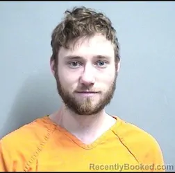 Mugshot of LOGAN KENNETH REYNOLDS