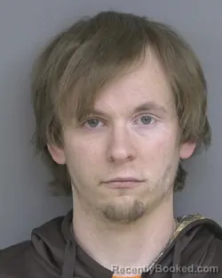 Booking photo from Dubuque County, Iowa