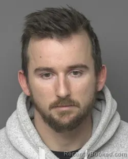 Mugshot of JUSTIN MICHAEL KAST