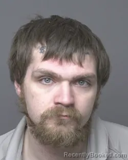 Booking photo from Dubuque County, Iowa